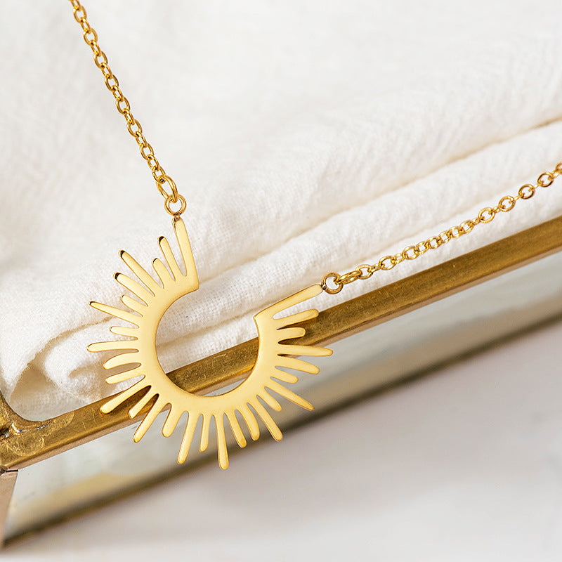 Elegant half sunburst pendant necklace