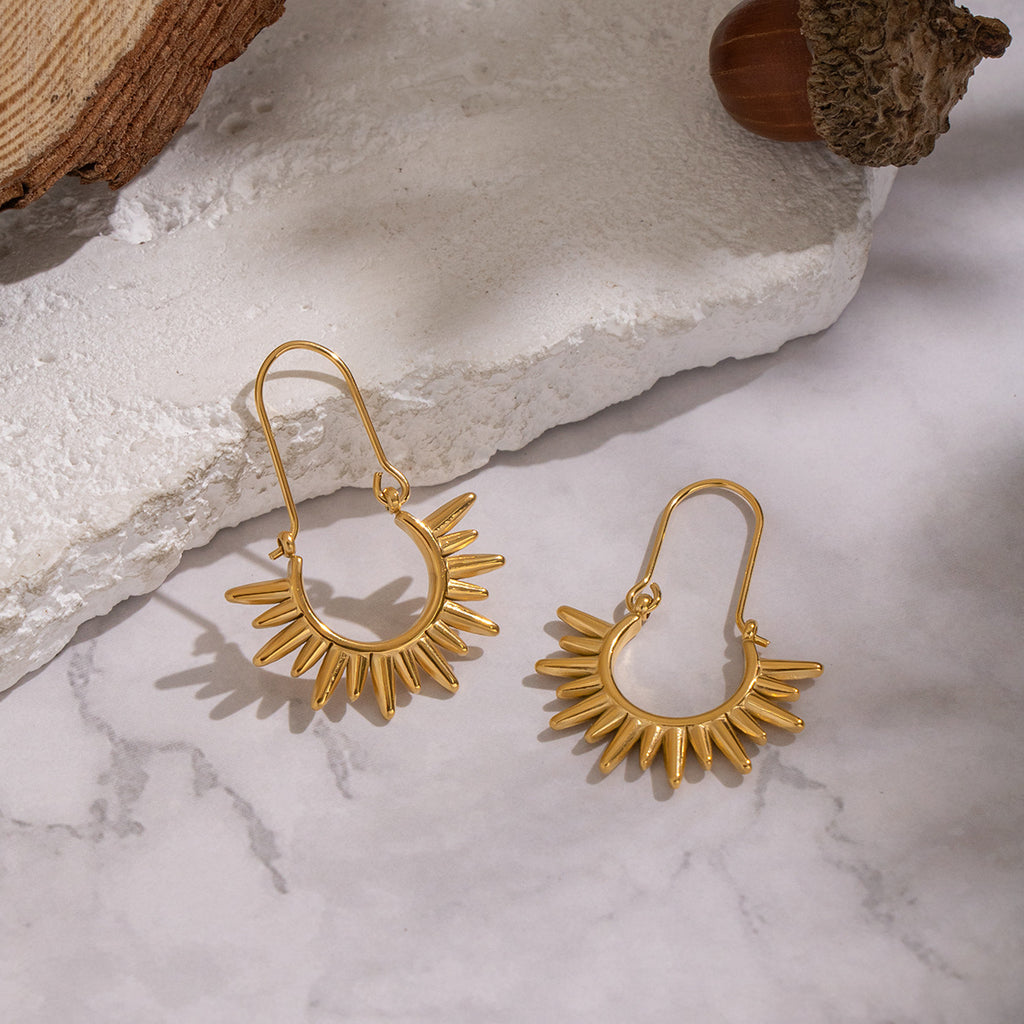 Sunburst dangle earrings