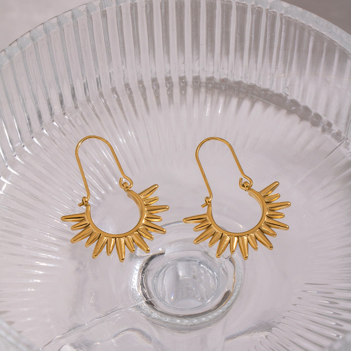Sunburst dangle earrings