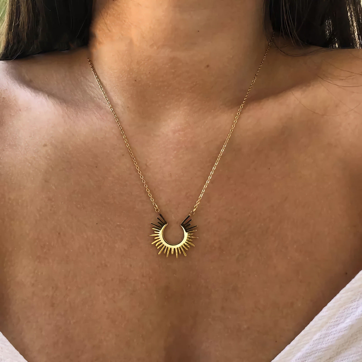 Elegant half sunburst pendant necklace