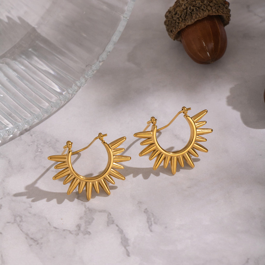 Sunburst dangle earrings