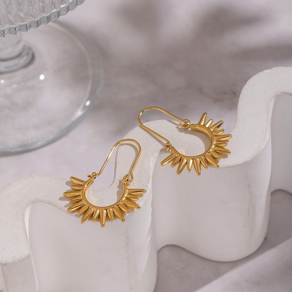 Sunburst dangle earrings