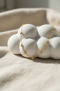 Delicate Geometric bracelet with six circular encased Zirconia stones