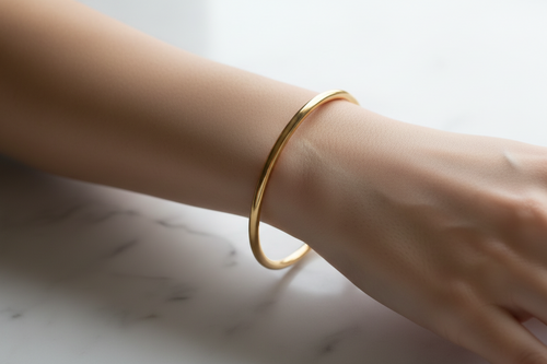 Classic oval gold bangle bracelet