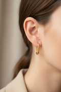 Minimalist oval gold hoop earrings