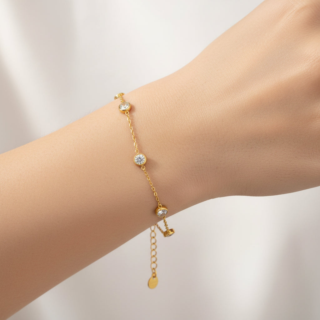 Delicate Geometric bracelet with six circular encased Zirconia stones